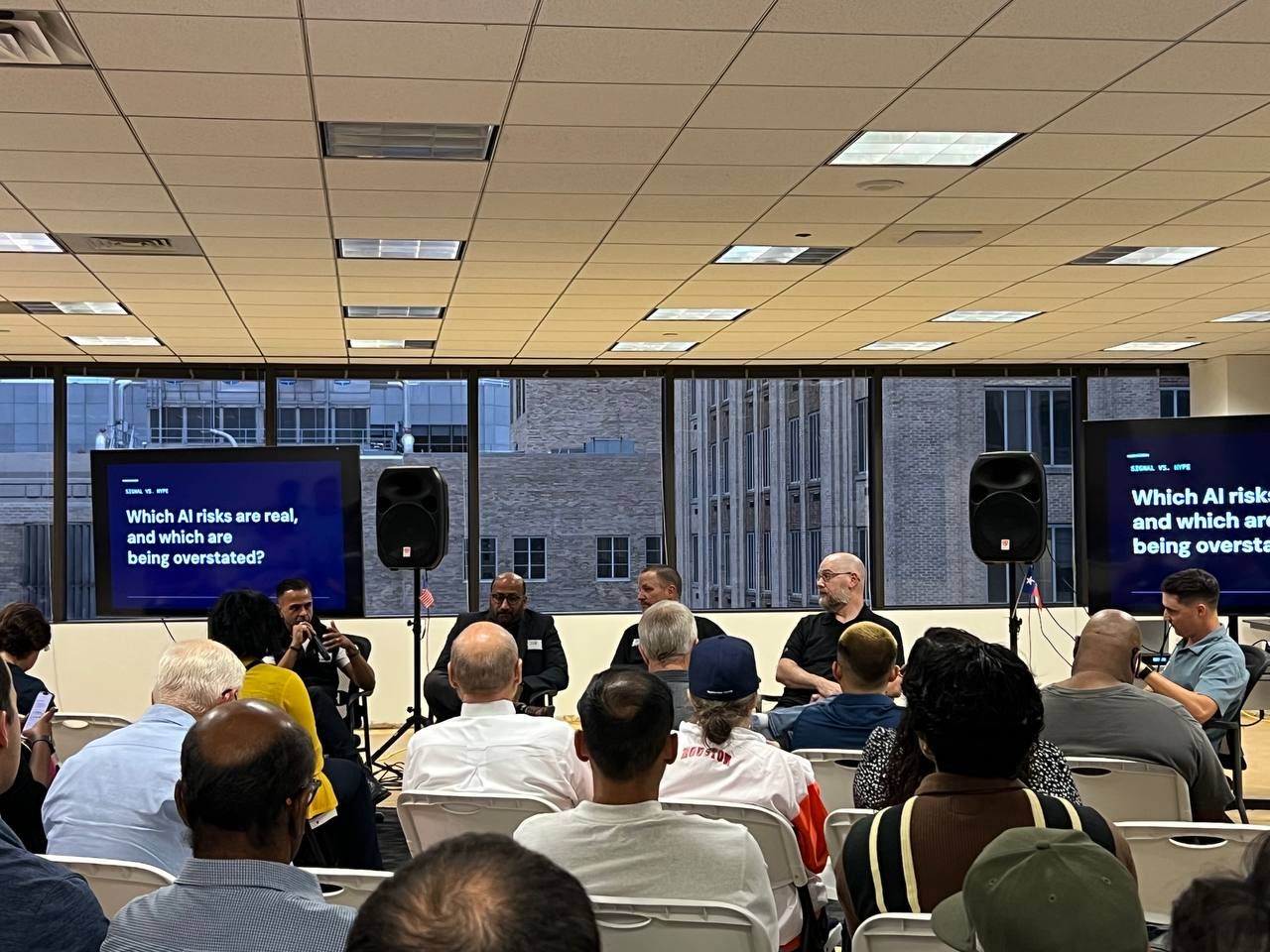 Houston AI Club panel discussion on AI governance and cybersecurity, with panelists and audience