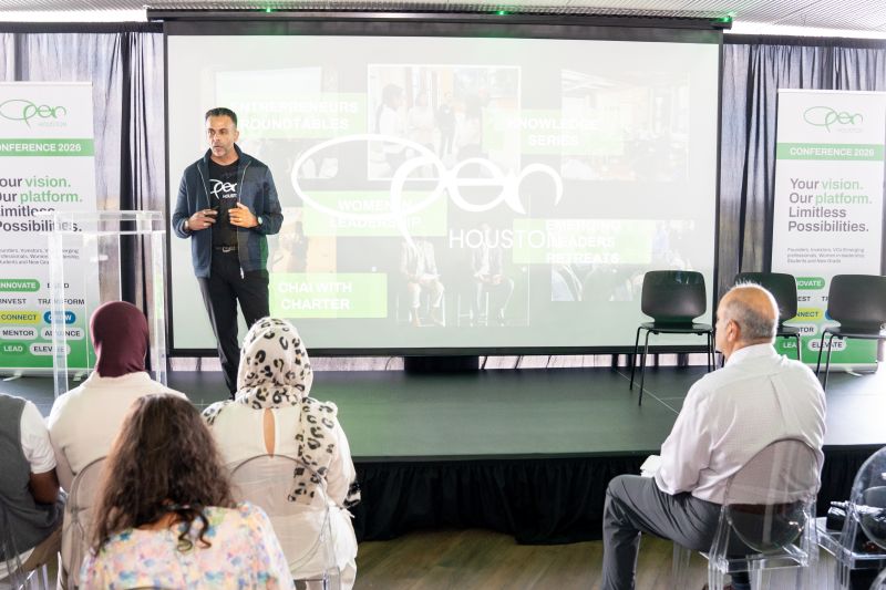 Salim Gheewalla delivering the opening address at the 11th Annual OPEN Houston Conference at POST Houston